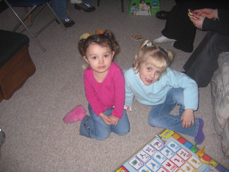 Playing with her cousin Courtney.