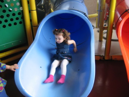 She's never scared to go down the big slides.