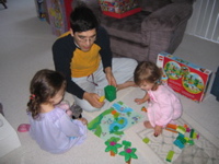 Miguel playing the Dora game with his nieces. 