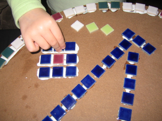 Then we started gluing tiles.