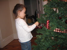 She was very careful with the placement of each ornament