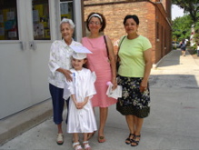 With her great grandmother, aunt, and grandma.