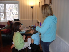 Heather ran a little beauty salon for family pictures. 