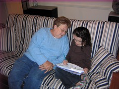Reading with grandma.