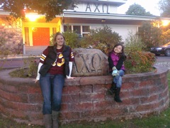 Heather and Novali at the Alpha Chi house. Got her sorority pose already....
