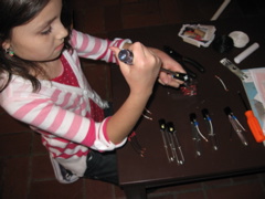 Here she is screwing on the pigtail connectors