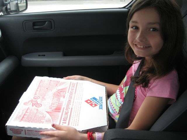 Yes, yes you can get a pizza on a road trip stop. 